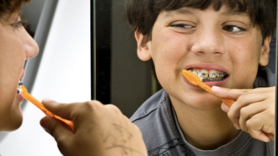 boy brushing teeth